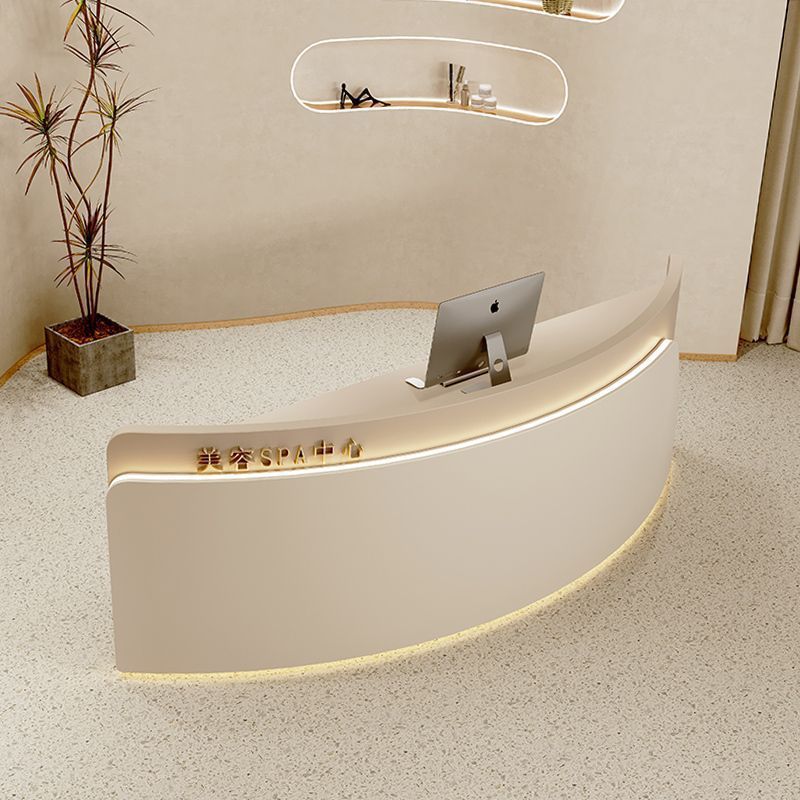 Curved Desk with Warm Backlit Patterns Curved Desk with Warm Backlit Patterns